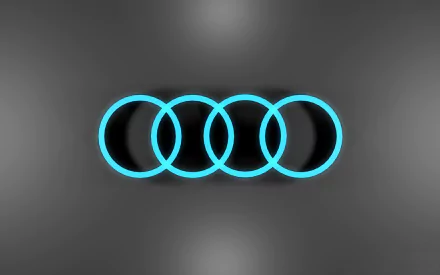 HD desktop wallpaper featuring the Audi logo with glowing blue outlines on a dark gradient background.