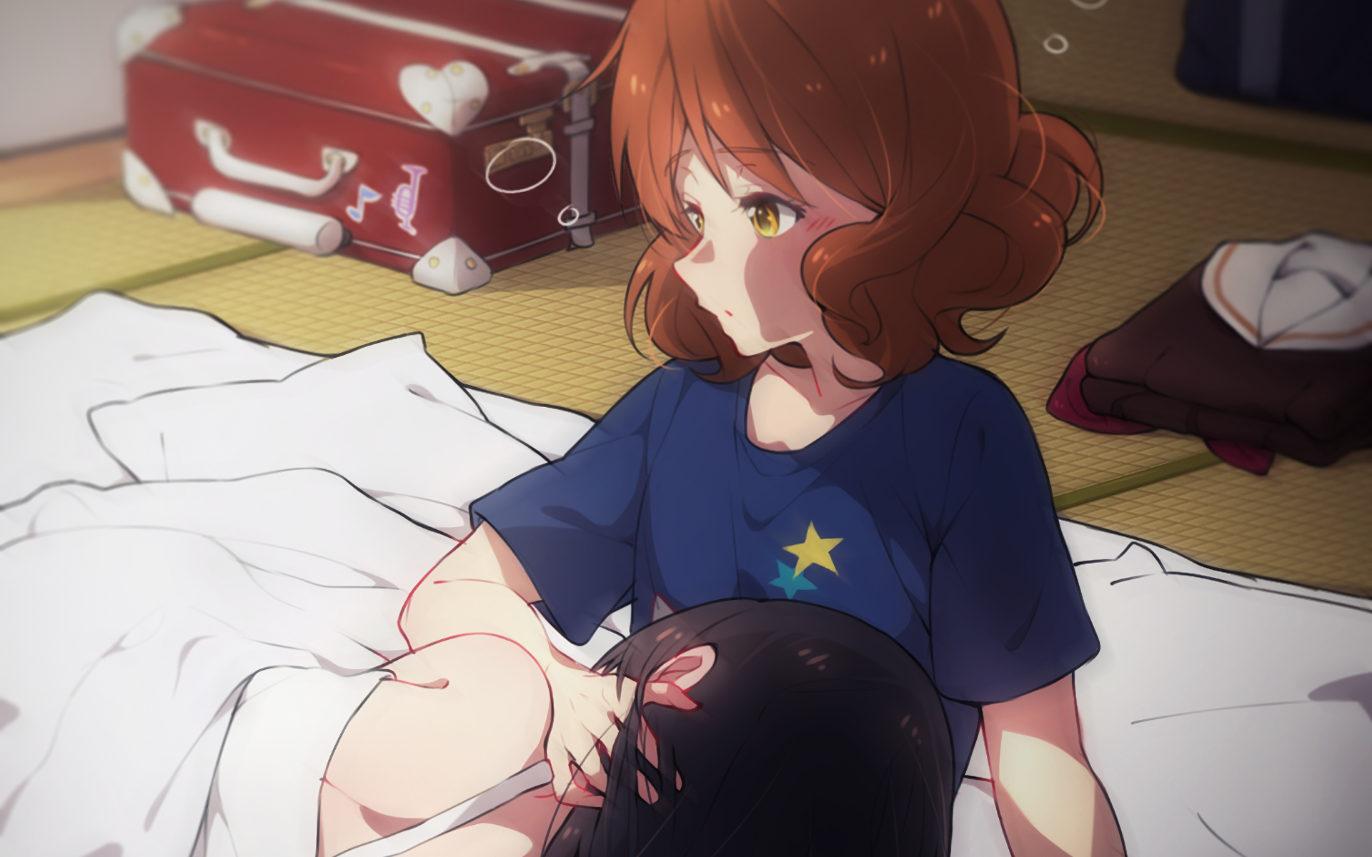 HD PC desktop wallpaper and background: anime Sound! Euphonium scene of two girls on a futon — a redhead in a blue star shirt cradling a dark-haired girl, warm bedroom glow.