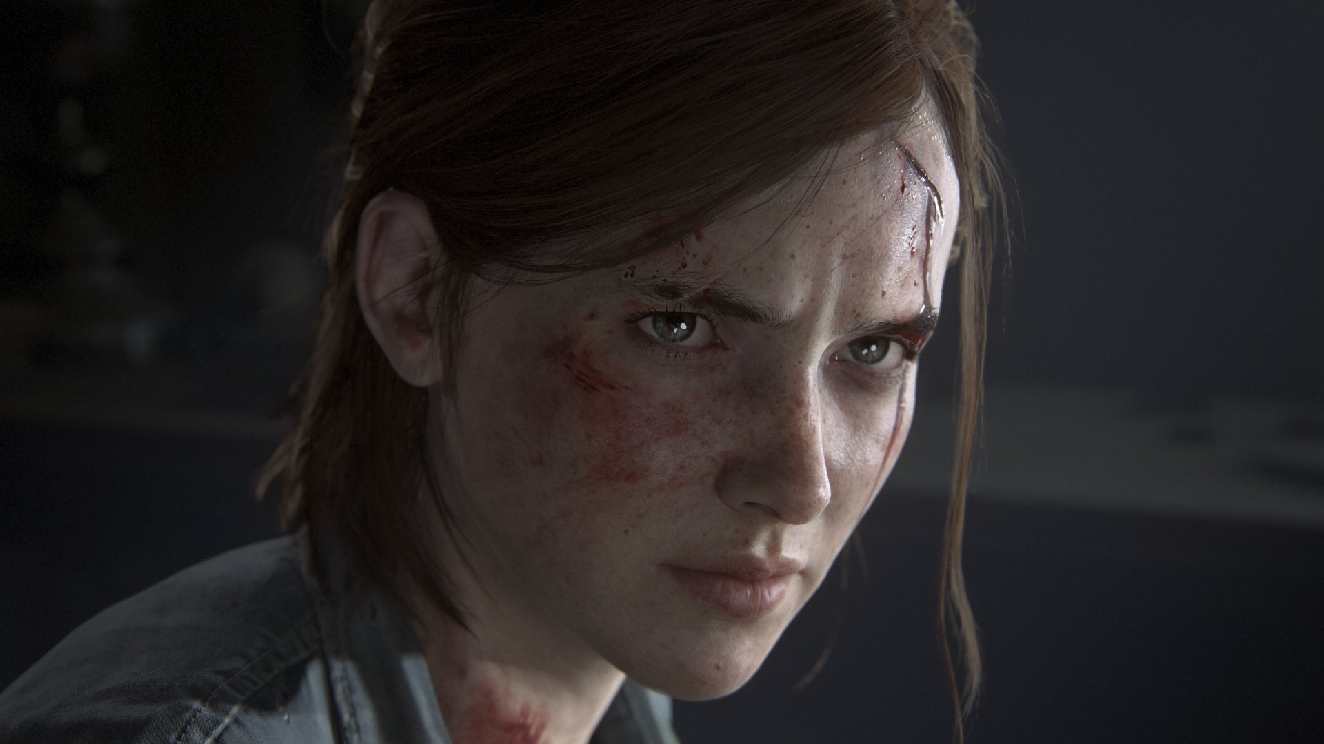 HD desktop wallpaper of Ellie from The Last of Us Part II video game, showcasing her intense expression with dirt and cuts on her face.