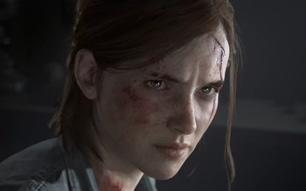 HD desktop wallpaper of Ellie from The Last of Us Part II video game, showcasing her intense expression with dirt and cuts on her face.