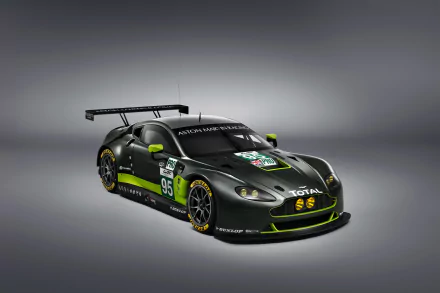 Aston Martin V8 Vantage GTE race car in matte black with lime accents on a neutral backdrop — 4K Ultra HD PC desktop wallpaper