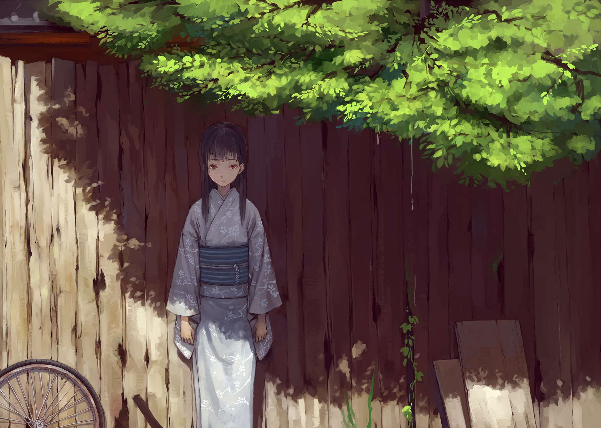 An original anime HD wallpaper featuring a girl in traditional attire standing against a wooden fence, with sunlight filtering through leafy branches above.