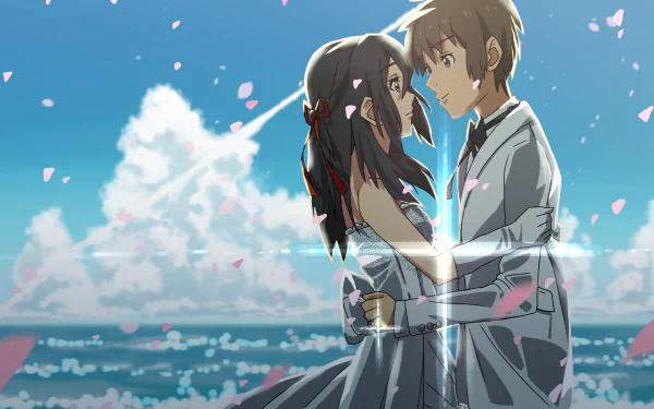 A serene HD wallpaper featuring Taki Tachibana and Mitsuha Miyamizu from Your Name. They embrace against a backdrop of clouds and ocean, surrounded by drifting cherry blossoms.
