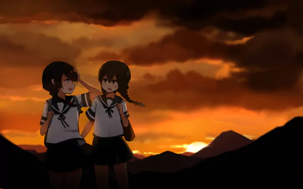 Uranami and Isonami from Kantai Collection in sailor uniforms stand together before a fiery sunset over silhouetted mountains — anime HD PC desktop wallpaper/background.