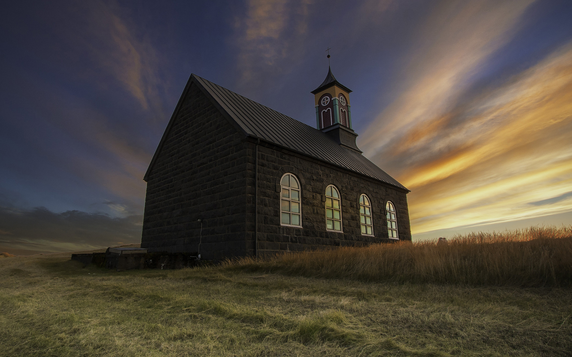 Chapel in a Field at Sunset by Ásmundur Þorkelsson