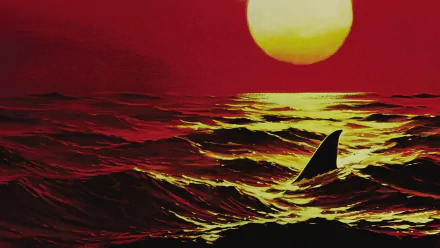 HD PC desktop wallpaper background for the movie Jaws 2: a lone shark fin cuts through golden waves beneath a blood-red sunset.