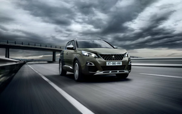 HD desktop wallpaper of a Peugeot 3008 SUV driving on a highway under a dramatic cloudy sky, showcasing the sleek design of this vehicle.