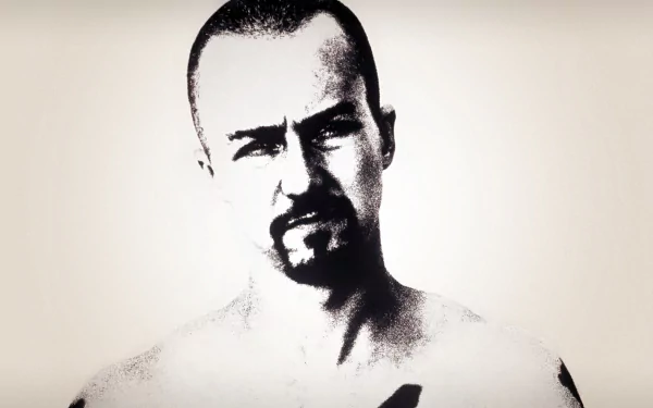 High-contrast black-and-white close-up of a shaved-headed man with an intense stare, from the movie American History X — HD PC desktop wallpaper and background.