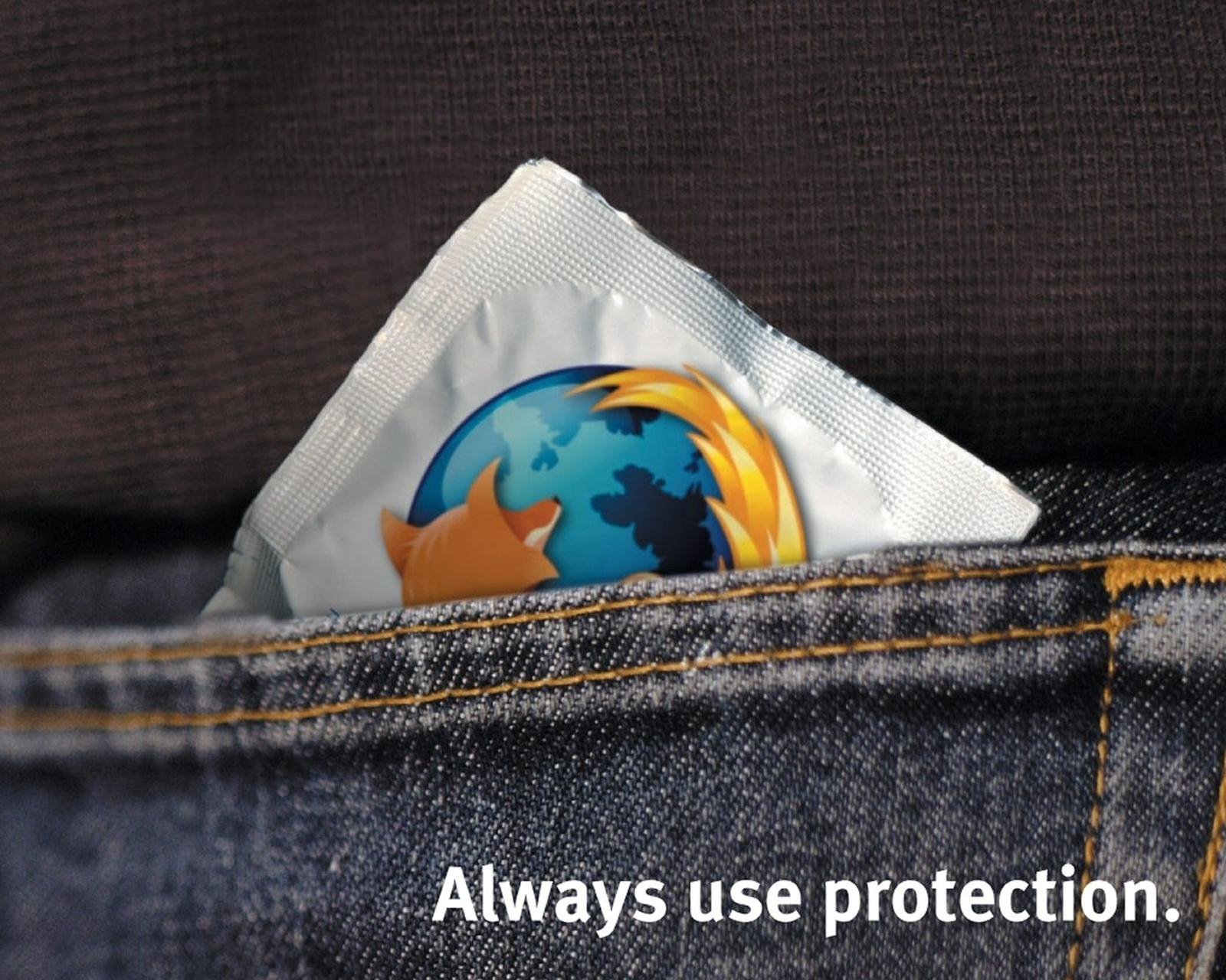 HD desktop wallpaper showing a Mozilla Firefox logo on an internet browser-themed background, tucked into the pocket of blue denim jeans, representing technology and browsing.
