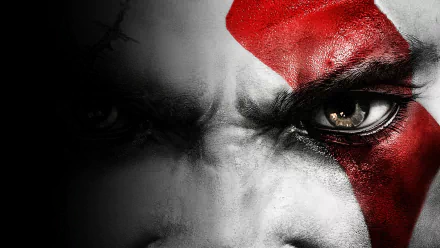 Close-up HD desktop wallpaper of Kratos from God of War III, showing his intense gaze and iconic red facial paint.