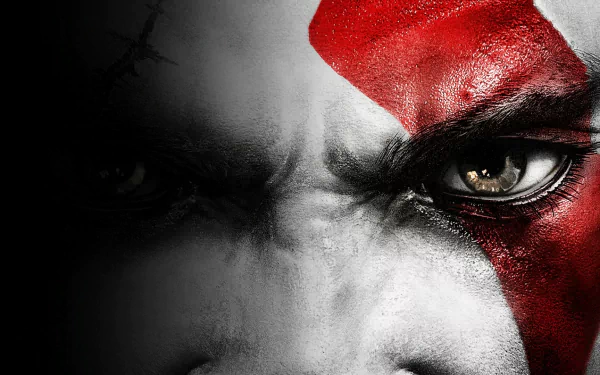 Close-up HD desktop wallpaper of Kratos from God of War III, showing his intense gaze and iconic red facial paint.