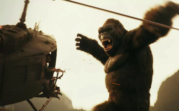 HD PC desktop wallpaper from the movie Kong: Skull Island, featuring a giant gorilla roaring at a helicopter in a dramatic action scene.