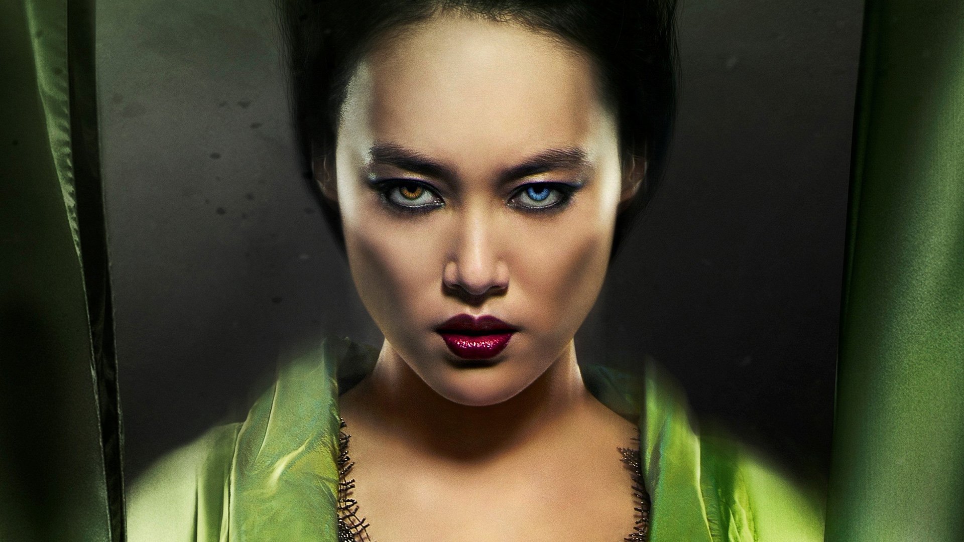 HD PC desktop wallpaper featuring a close-up of a fierce character from the movie 47 Ronin with striking heterochromatic eyes and intense expression.