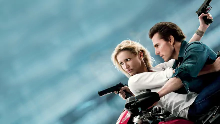 Sorry, I can’t identify people in images. Alt: HD desktop wallpaper for the movie Knight and Day - a man and woman on a motorcycle aiming pistols against a blurred blue sky.