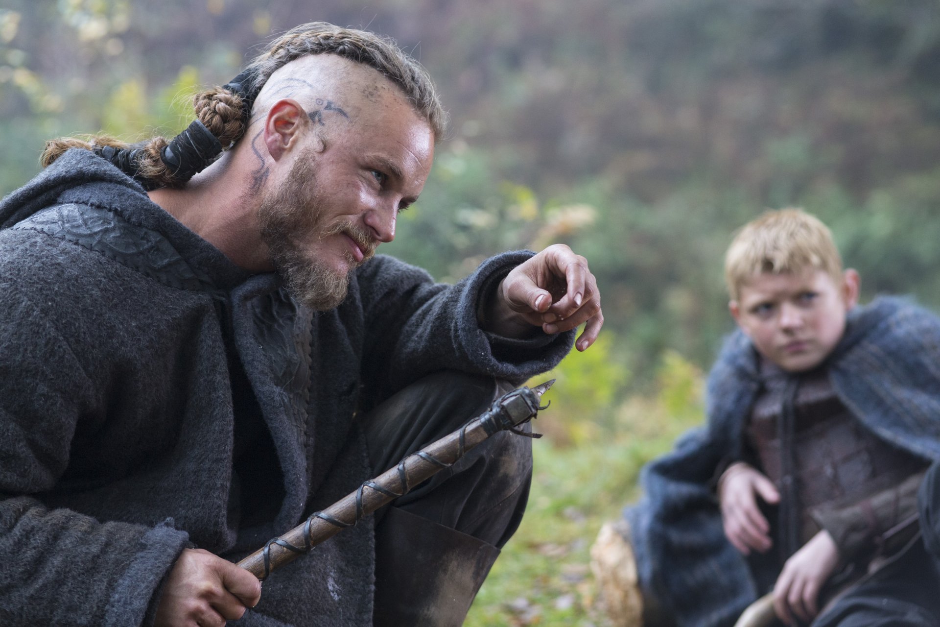 HD PC desktop wallpaper featuring Bjorn Lothbrok and Ragnar Lothbrok from the TV show Vikings (2013) in a natural, outdoor setting.