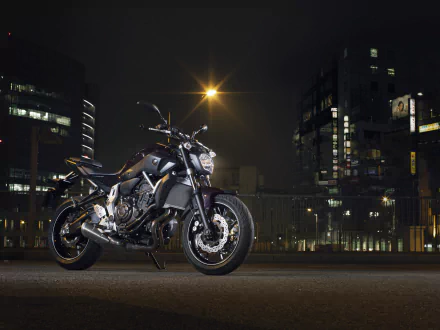 Yamaha MT-07 motorcycle parked on a city street at night, captured in 4K Ultra HD for a sharp PC desktop wallpaper background.