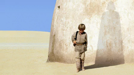 HD desktop wallpaper featuring young Anakin Skywalker casting a shadow forming Darth Vader against a wall, from Star Wars Episode I: The Phantom Menace.