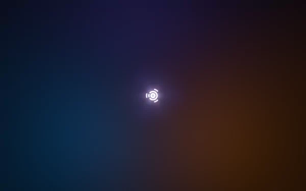 Minimalist HD desktop wallpaper featuring the Ubuntu logo at the center with a subtle gradient background blending deep blue and orange hues.