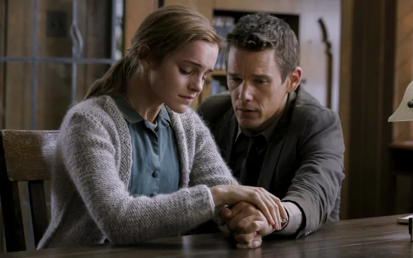 HD desktop wallpaper featuring Emma Watson and Ethan Hawke in a tense scene from the movie Regression.