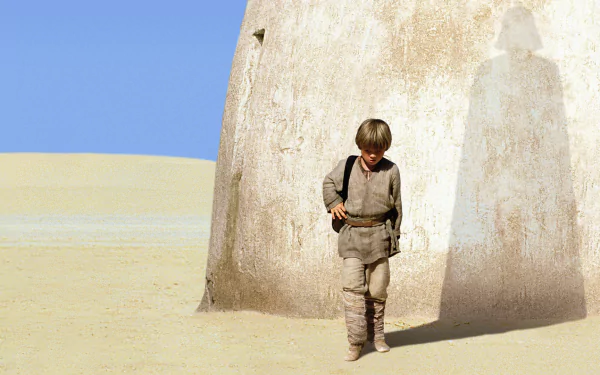 HD desktop wallpaper featuring young Anakin Skywalker casting a shadow forming Darth Vader against a wall, from Star Wars Episode I: The Phantom Menace.