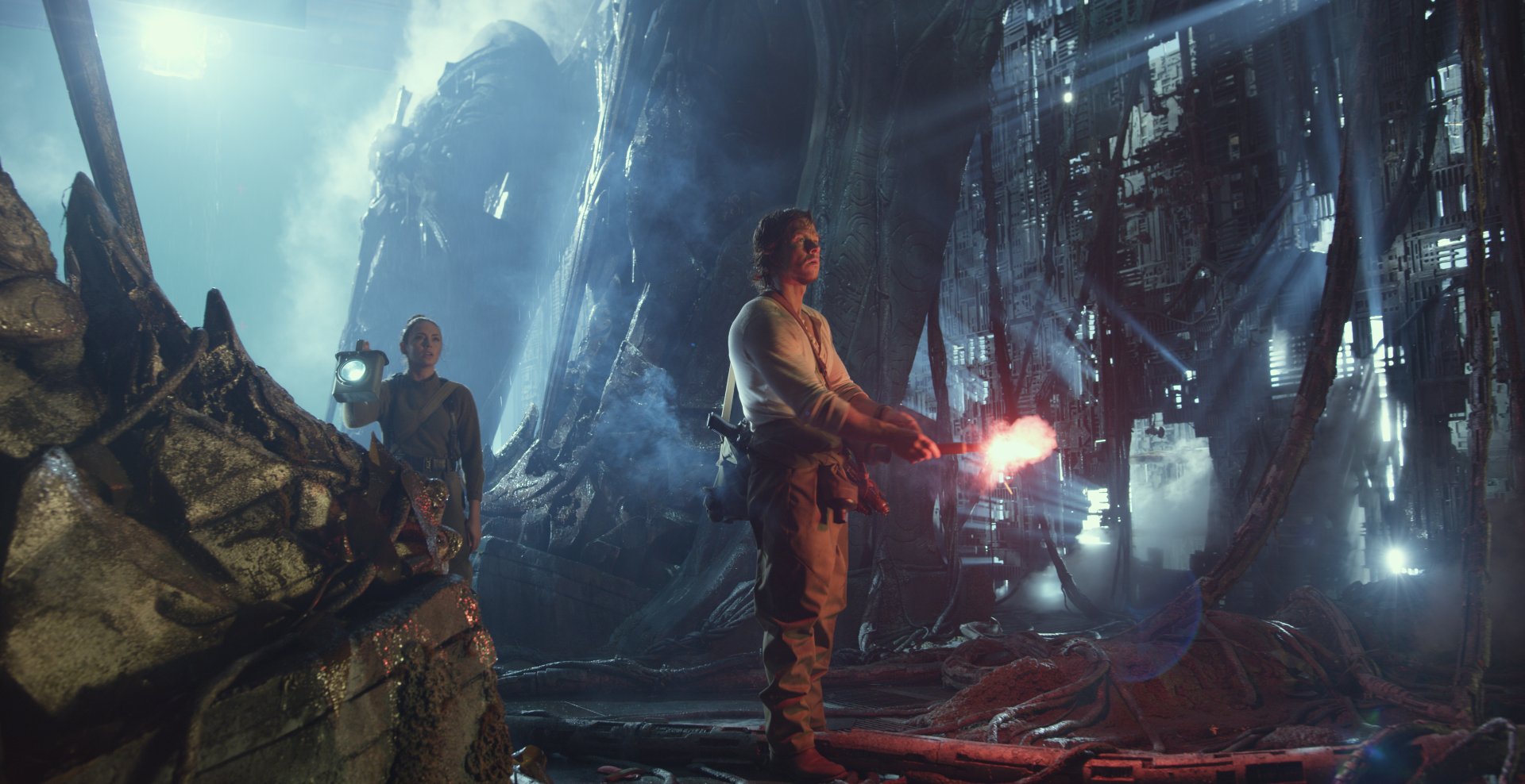 HD desktop wallpaper featuring Laura Haddock and Mark Wahlberg in a scene from Transformers: The Last Knight, showcasing a cinematic, atmospheric background.