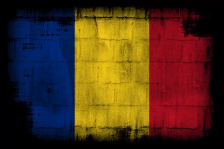 Misc: grungy Romanian flag painted on a brick wall — vertical blue-yellow-red tricolor, stylized 2K Quad HD PC desktop wallpaper and background.
