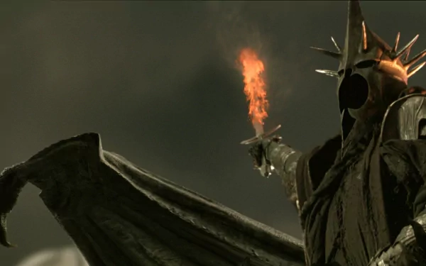 A dramatic HD wallpaper from The Lord of the Rings: The Return of the King, featuring a menacing dark figure holding a flaming sword against a stormy backdrop.