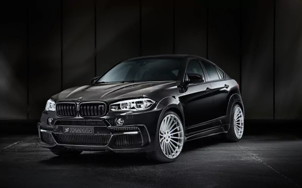 Black BMW X6 car in a dark studio with glossy finish and aggressive stance — 4K Ultra HD PC desktop wallpaper and background.