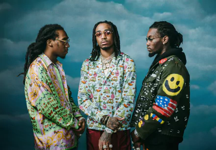 HD wallpaper featuring the hip-hop trio Migos posing confidently against a cloudy sky background.