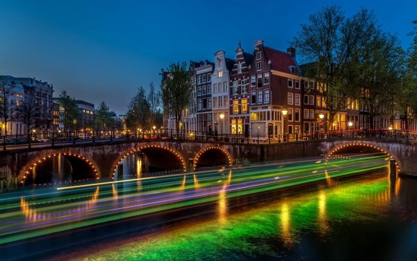 Man Made Amsterdam Cities Netherlands Light Bridge Night Building House Canal Time-Lapse HD Wallpaper | Background Image