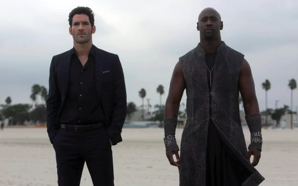 Tom Ellis as Lucifer Morningstar and D.B. Woodside as Amenadiel stand side by side on a beach scene from the TV show Lucifer. This HD wallpaper captures the dramatic essence of the characters.
