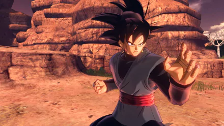 HD desktop wallpaper featuring Goku from Dragon Ball Xenoverse 2 video game, striking a combat pose amidst rocky terrain.