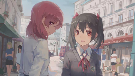 HD anime wallpaper featuring Maki Nishikino and Nico Yazawa from Love Live! standing together on a sunny, bustling city street.