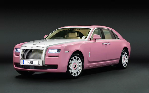 HD desktop wallpaper featuring a pink Rolls-Royce Ghost luxury vehicle against a dark background.