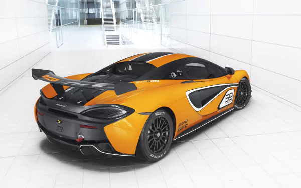 HD desktop wallpaper featuring an orange McLaren 570S GT4 race car in a sleek white garage setting.