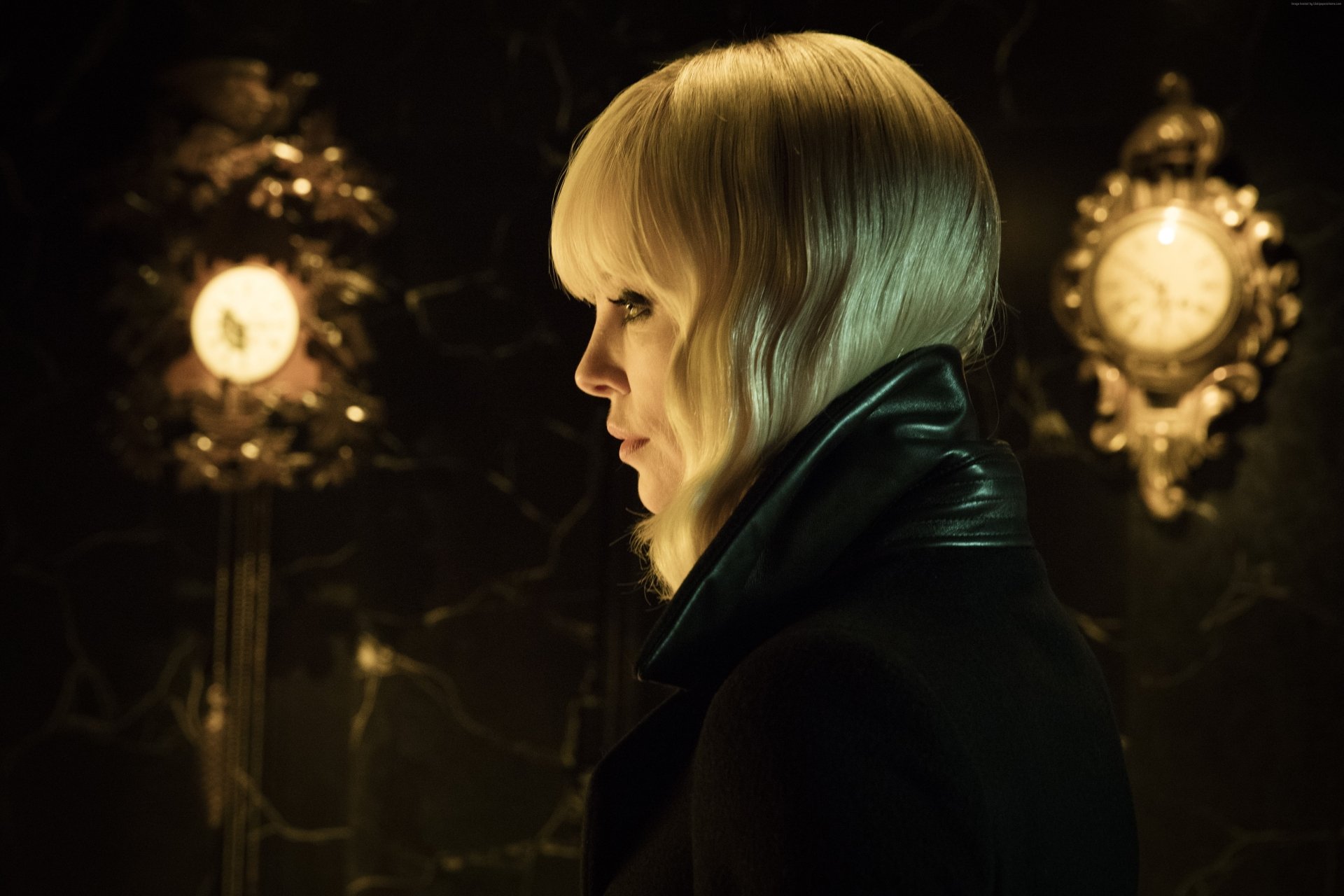 Profile view of Charlize Theron as the lead character in the movie Atomic Blonde, featured in a 4K Ultra HD PC desktop wallpaper.