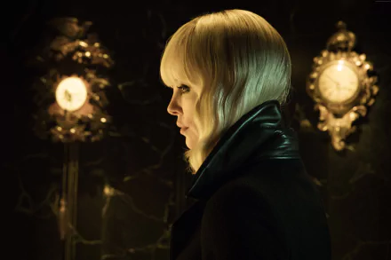 Profile view of Charlize Theron as the lead character in the movie Atomic Blonde, featured in a 4K Ultra HD PC desktop wallpaper.