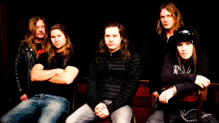 HD PC wallpaper of a five-member death/heavy/thrash metal band: moody dark background, long hair, leather jackets and intense expressions conveying aggressive melodic metal music energy.