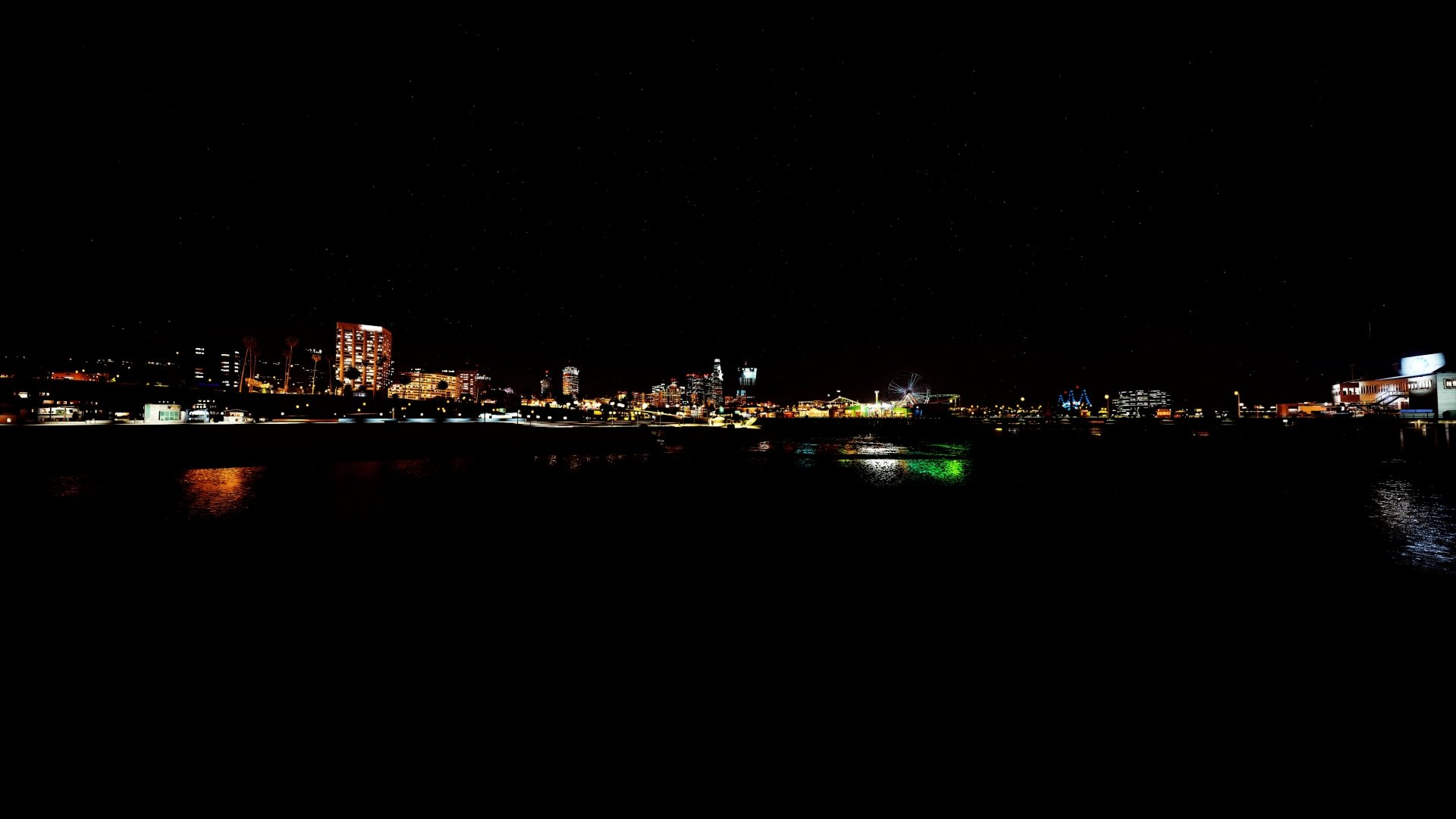 Nighttime cityscape of Los Santos from Grand Theft Auto V, captured in stunning 4K Ultra HD for a vivid PC desktop wallpaper and background.