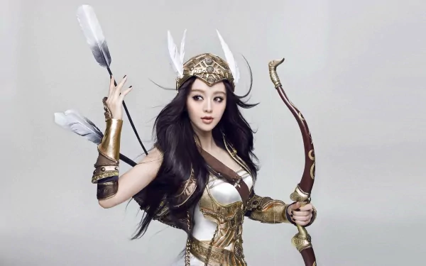 A fantasy archer in ornate armor holds a bow and arrows, with long flowing hair and feathers, showcasing a striking and dramatic presence against a subtle background. HD wallpaper.