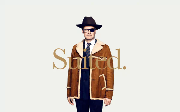 HD desktop wallpaper featuring Colin Firth from Kingsman: The Golden Circle in a stylish outfit, with the word Suited.