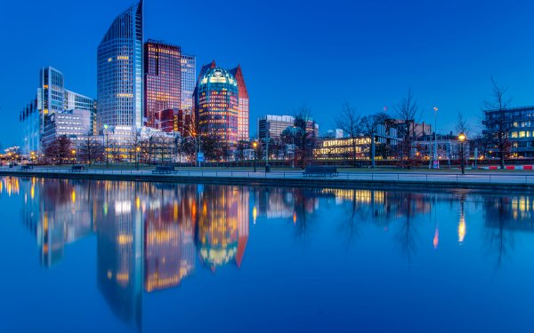 Man Made The Hague Cities Netherlands Night City Building Skyscraper River Reflection HD Wallpaper | Background Image