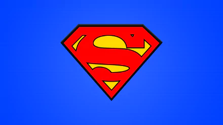 A high-definition desktop wallpaper featuring the iconic Superman logo in red and yellow on a vibrant blue background, tagged with DC Comics and Comic.