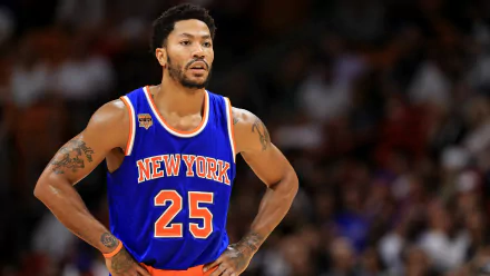 HD desktop wallpaper featuring Derrick Rose in a New York Knicks jersey during a basketball game.