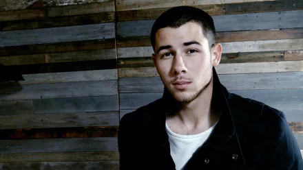 HD wallpaper featuring a person against a wooden backdrop for a desktop background.