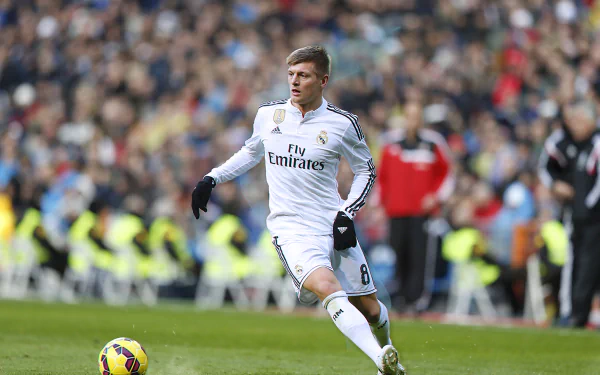 Toni Kroos of Real Madrid C.F. in action during a soccer match, captured in high-definition suitable as a PC desktop wallpaper and background.