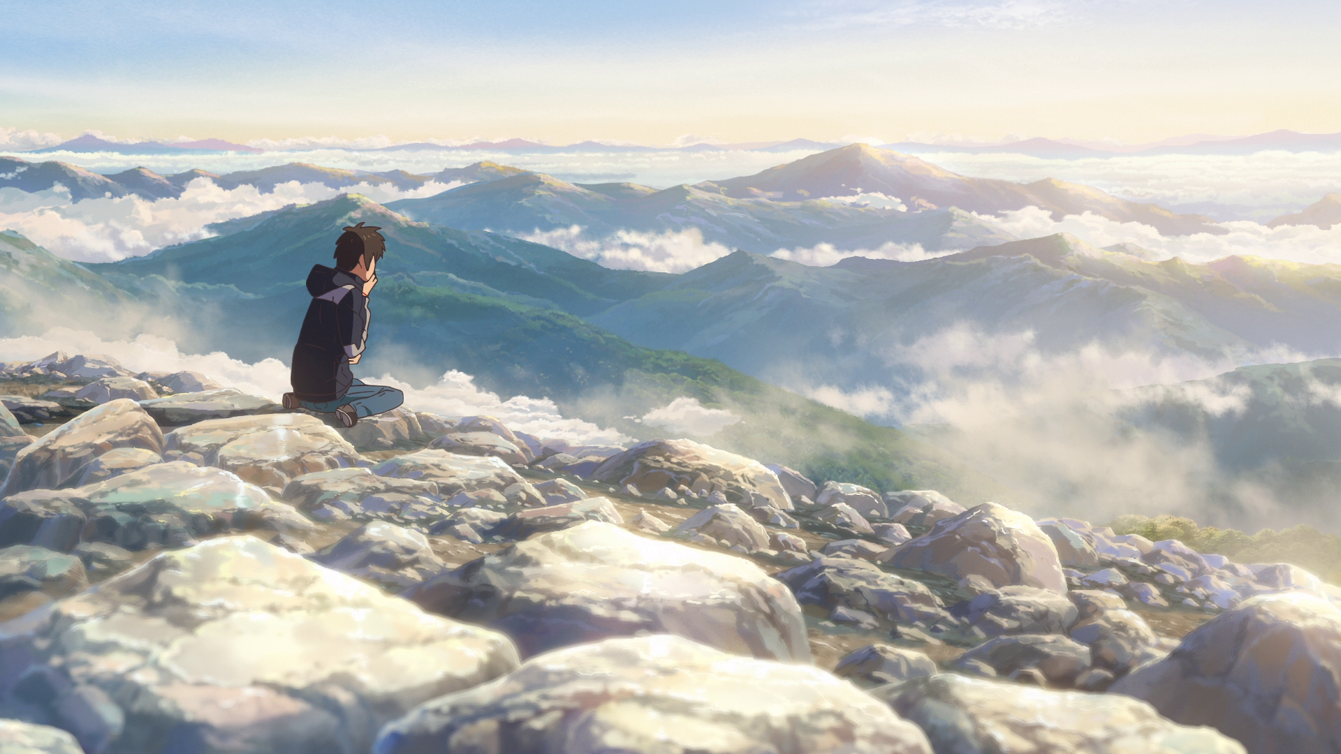 Taki Tachibana from Your Name. sits on rocky terrain overlooking misty mountains in this HD anime desktop wallpaper.