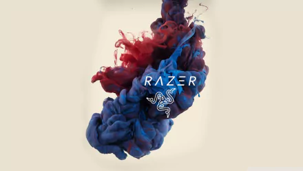 HD desktop wallpaper with a vibrant mix of red and blue ink clouds, featuring the Razer logo prominently in the center.