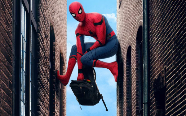 HD desktop wallpaper featuring Spider-Man (Peter Parker) from the movie 'Spider-Man: Homecoming,' showing him crouching with a backpack between two buildings.