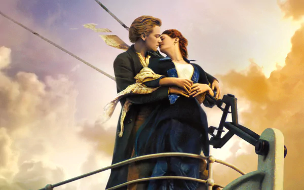 HD desktop wallpaper featuring Leonardo DiCaprio and Kate Winslet in an iconic scene from the movie Titanic, standing at the ship's bow at sunset.